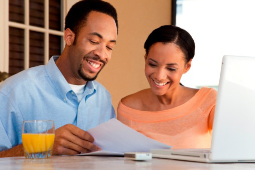 A couple looking at papers