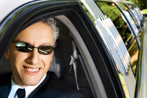 Limousine Driver Smiling at the Camera