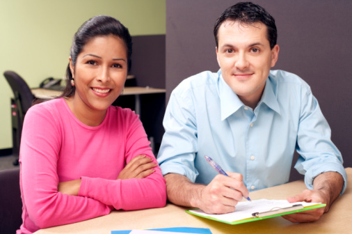 Couple filling out paperwork