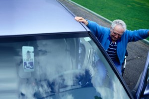 Senior Disabled Man Getting Into the Car