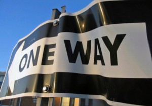 Damaged One Way Road Sign