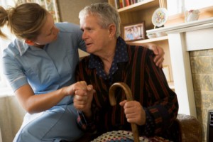 Nurse Assisting Elderly Man