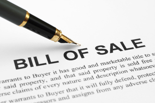 A pen on a bill of sale