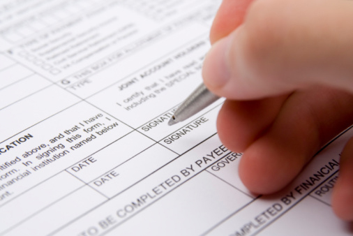 Hand and Paperwork