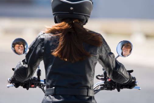 Woman Riding Her Motorcycle