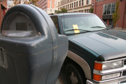 Parking Ticket on Windshield of Truck