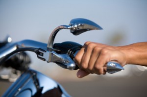 Man Holding Motorcycle Handlebar