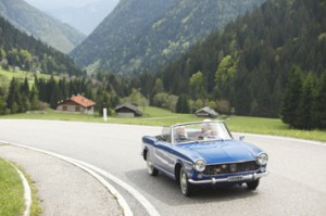 Couple Driving Through the Country in Italy