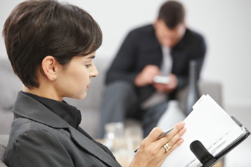 Woman Looking at Calendar Planner